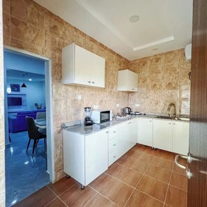 Family Apartment, Balcony, City View | Private kitchen