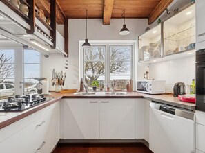 Fridge, microwave, dishwasher, cookware/dishes/utensils