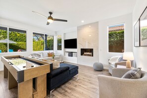 Smart TV, fireplace, ping pong