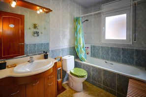 Hair dryer, bidet, towels, soap