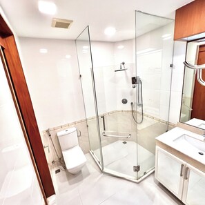 Shower, hair dryer, towels, soap