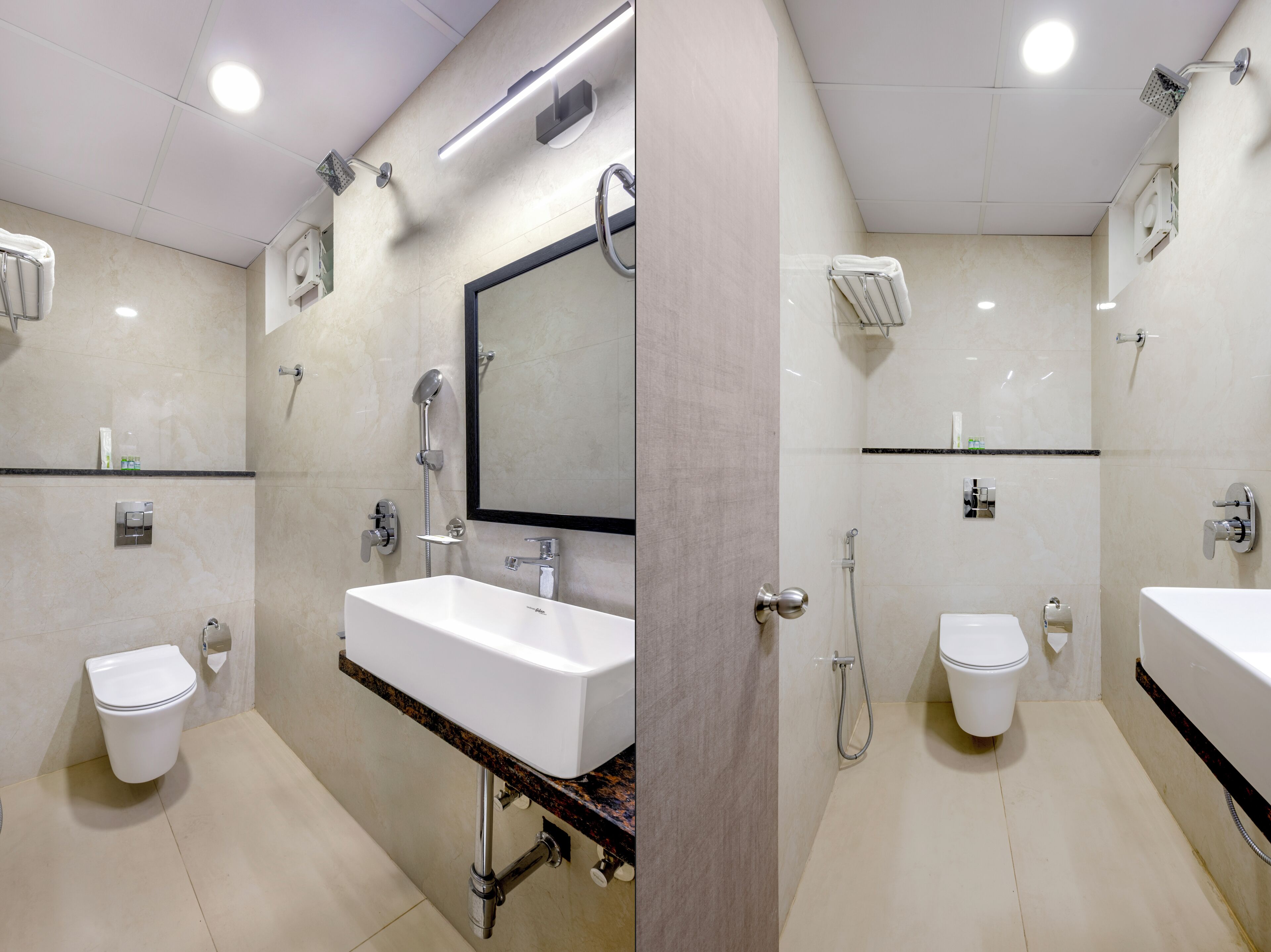 A modern bathroom with a white sink, a mirror, a shower, and a toilet.