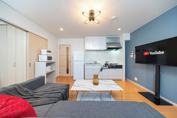 Family Apartment, Balcony | Living area