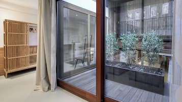 Luxury Quadruple Room, Courtyard View | In-room safe, blackout drapes, iron/ironing board, free WiFi