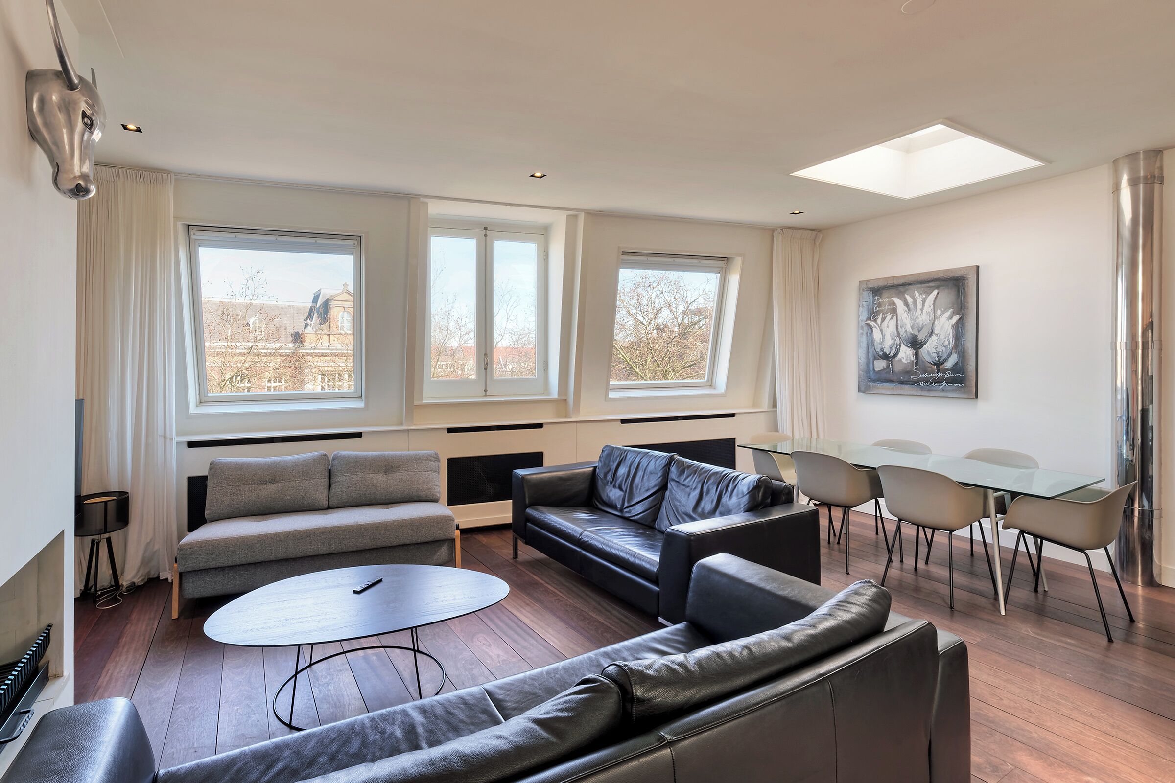 Superior Apartment, City View | Living area | 50-inch Smart TV with digital channels