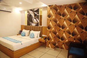Luxury Double Room, Balcony, City View | In-room safe, desk, laptop workspace, blackout curtains