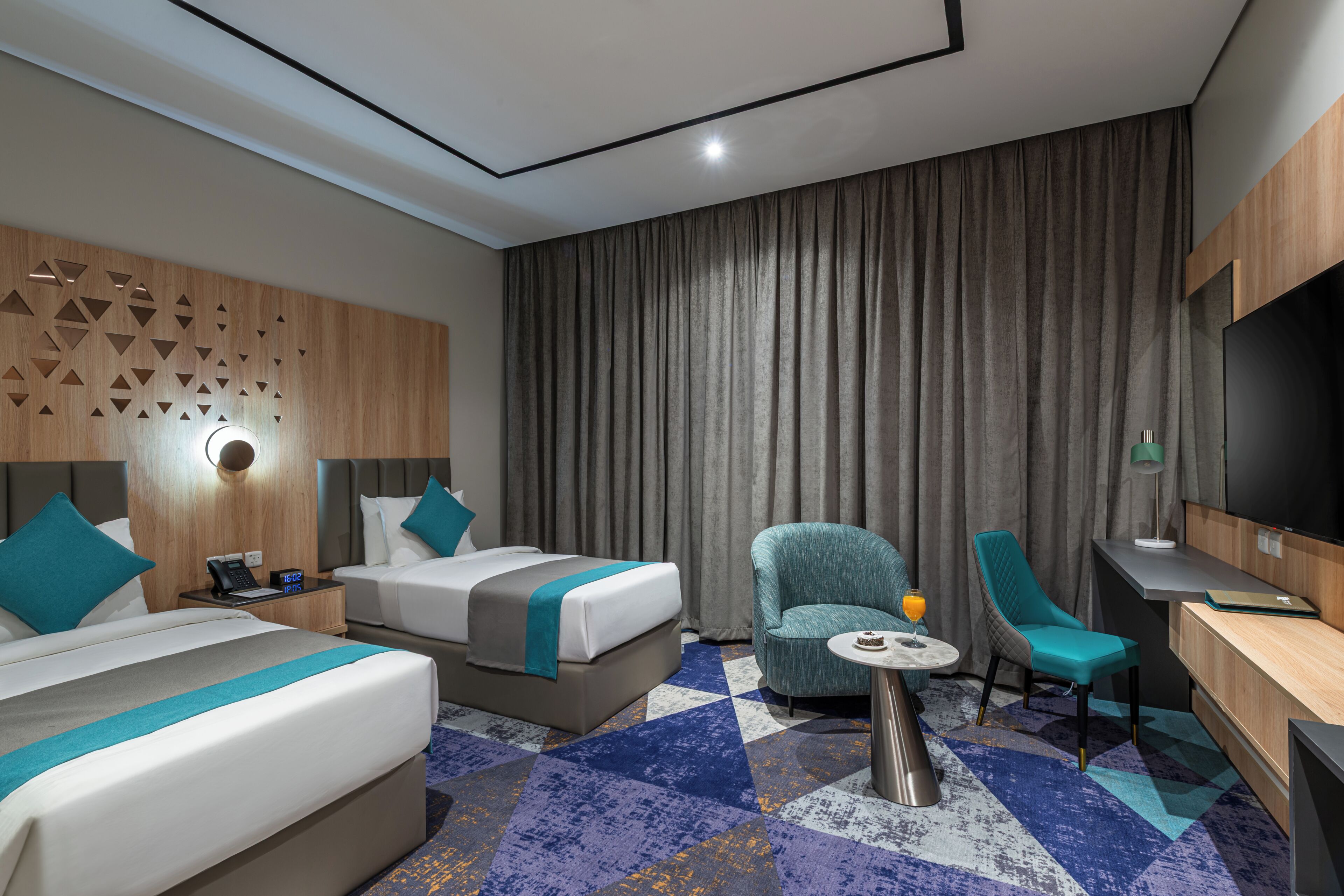 Chambre Deluxe Double ou avec lits jumeaux | Rideaux occultants, chambres insonorisées, fer et planche à repasser