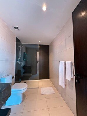 Shower, free toiletries, towels, soap