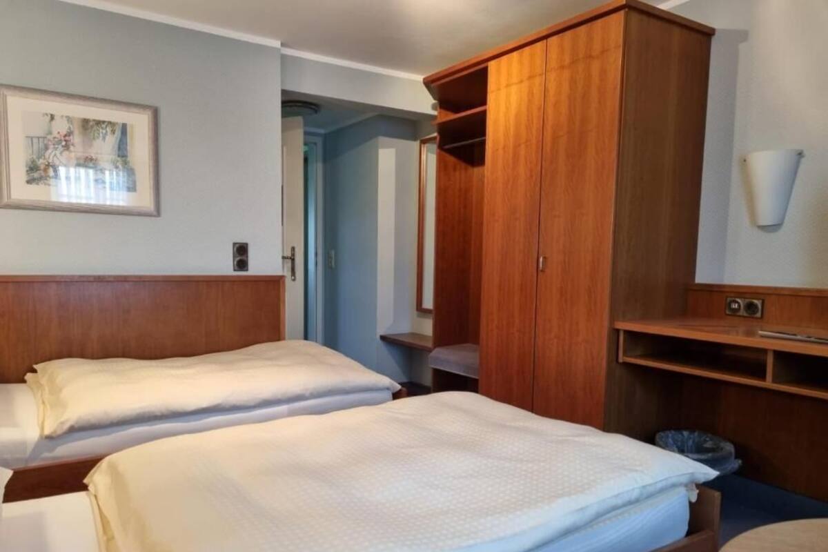 Comfort Twin Room, Multiple Beds, Non Smoking | Minibar, desk, laptop workspace, blackout drapes