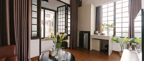 Deluxe-Apartment, Stadtblick | Wohnbereich
