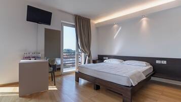 Quadrupla familiare, balcone | Una cassaforte in camera, Wi-Fi gratuito, lenzuola