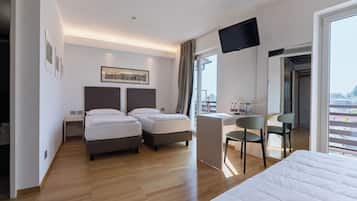 Family Room, Balcony | In-room safe, free WiFi