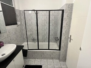 Hair dryer, towels, soap, toilet paper