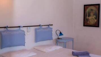 2 habitaciones, tabla de planchar con plancha, wifi y ropa de cama