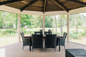 Outdoor dining - Modern Bayfront Escape with Sweeping Water Views (White Stone)