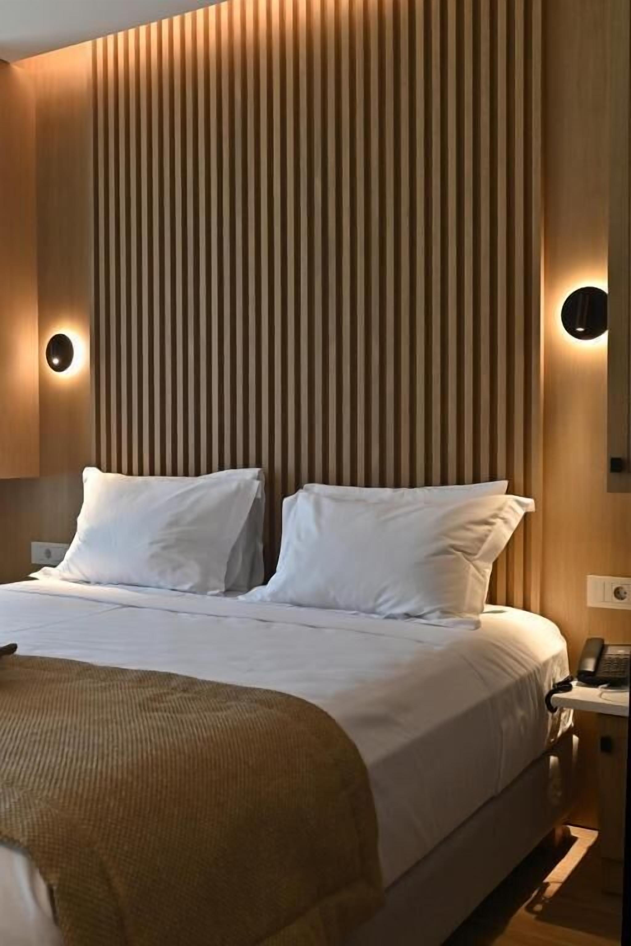 Suite Exécutive, balcon, vue jardin | Minibar, coffres-forts dans les chambres, bureau