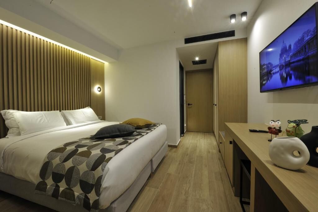 Chambre Deluxe Double ou avec lits jumeaux, balcon, vue jardin | Minibar, coffres-forts dans les chambres, bureau