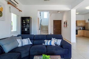 Villa, 3 Bedrooms, Patio, City View | Living room | 43-inch Smart TV with digital channels, streaming services