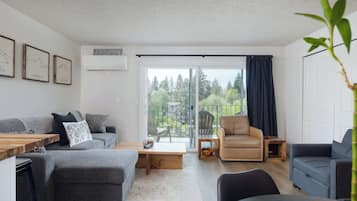 Condo, Multiple Beds, Balcony, River View (At the River) | Living area | 42-inch flat-screen TV with digital channels, fireplace