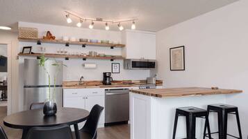 Condo, Multiple Beds, Balcony, River View (At the River) | Private kitchen | Fridge, microwave, coffee/tea maker, electric kettle