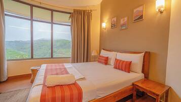Deluxe Double Room, Hill View | Laptop workspace, free WiFi, bed sheets
