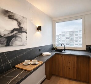 Family Apartment, Courtyard View | Private kitchen | Espresso maker, electric kettle, toaster - 1615 Quinet (Paris)