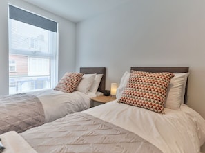 2 bedrooms, travel crib, free WiFi, bed sheets