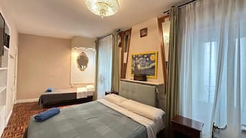 Triple Room, Shared Bathroom | Iron/ironing board, free WiFi