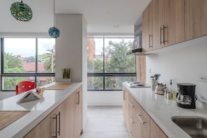 Apartamento conforto | Cozinha privada | Geladeira, micro-ondas, cafeteira/chaleira