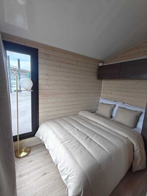 Premium bedding, memory-foam beds, blackout curtains, soundproofing