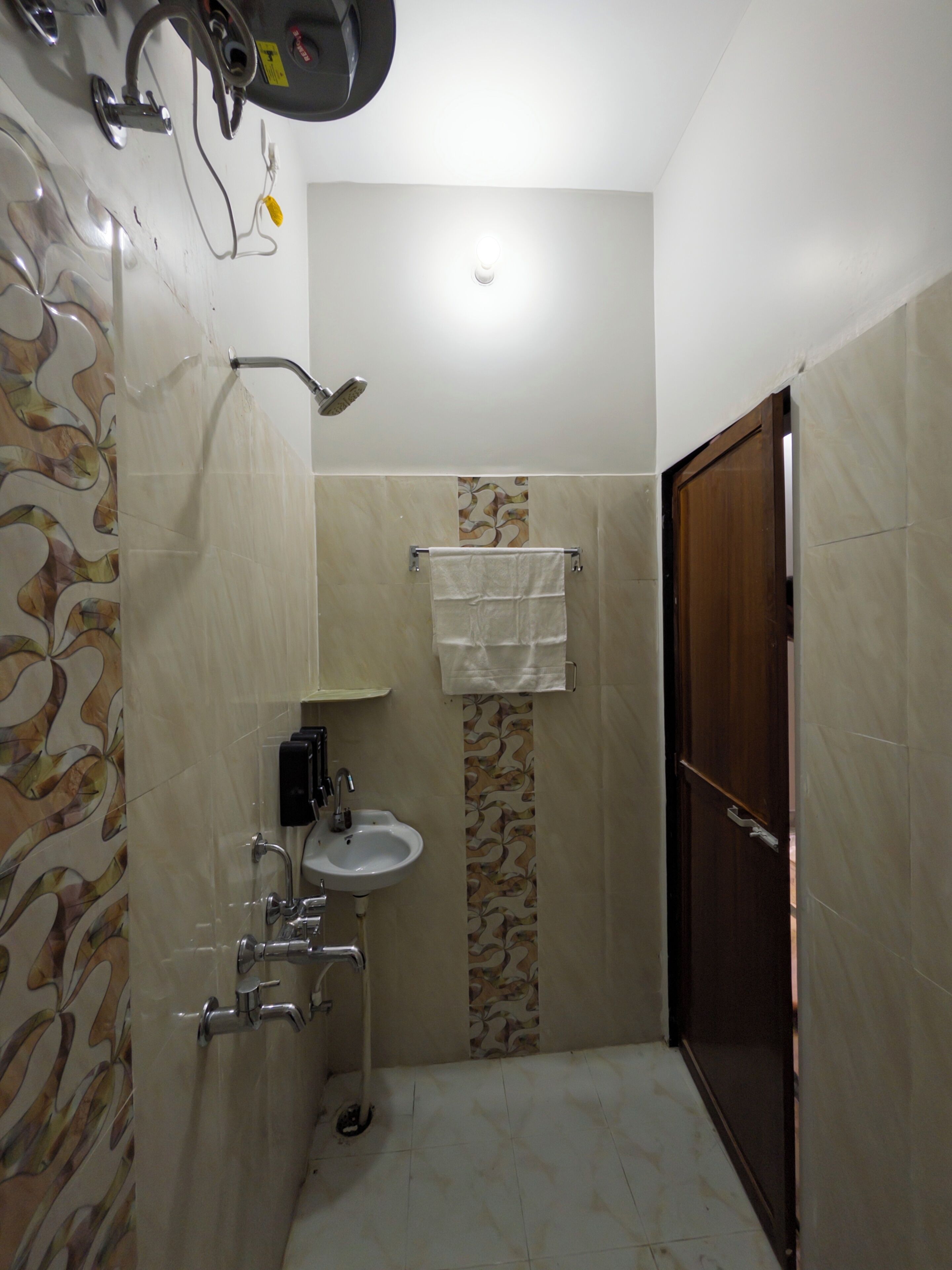Shower, eco-friendly toiletries, hair dryer, towels