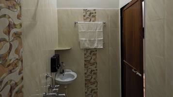 Shower, eco-friendly toiletries, hair dryer, towels