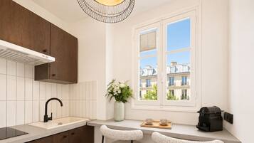 Superior Apartment, Courtyard View | Private kitchen | Espresso maker, electric kettle, toaster, freezer