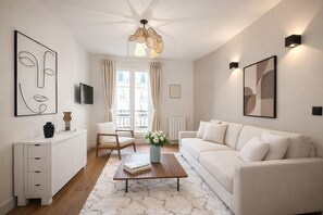 Superior Apartment, Courtyard View | Living area | 80-cm Smart TV with digital channels