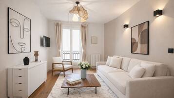 Superior Apartment, Courtyard View | Living area | 80-cm Smart TV with digital channels