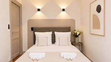 Iron/ironing board, travel crib, free WiFi, bed sheets