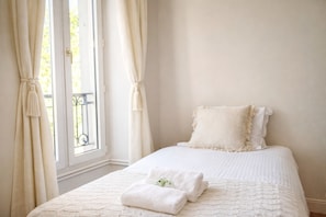 Superior Apartment, Courtyard View | Iron/ironing board, travel crib, free WiFi, bed sheets