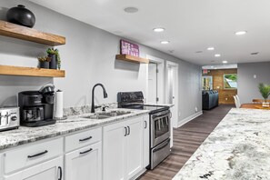 Fridge, microwave, stovetop, coffee/tea maker