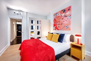 2 slaapkamers, een strijkplank/strijkijzer, reisbedje, gratis wifi