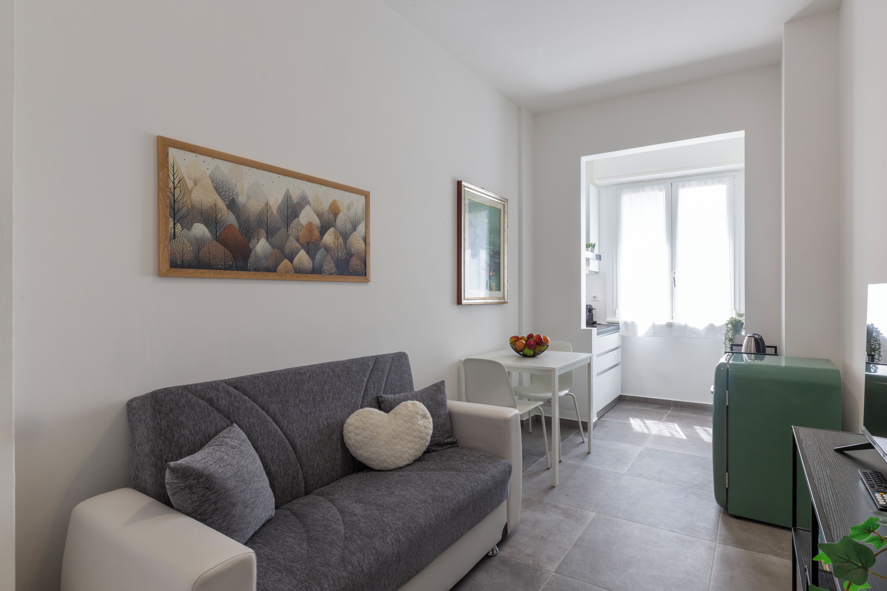 Comfort Apartment, Balcony | Living area | 32-inch Smart TV with digital channels