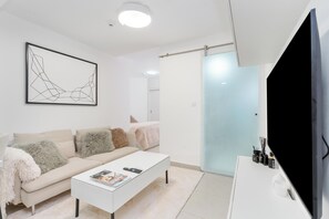 56-inch Smart TV with satellite channels - Samaya Holiday Homes Luxury- Studio (Dubai)