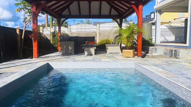 Unclassified image, 1 of 13, button - Apartment T3 with swimming pool and garden for your vacations in Guadeloupe (Baie-Mahault)