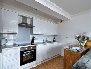 Microwave, oven, dishwasher, high chair