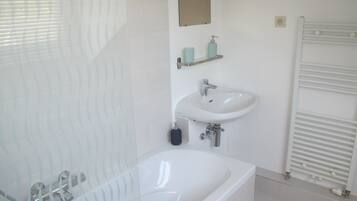 Hair dryer, towels, soap, toilet paper