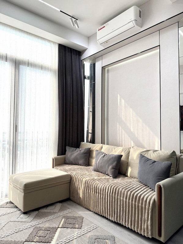 Family Condo, Balcony, City View | Desk, laptop workspace, blackout drapes, iron/ironing board