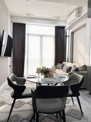 Family Condo, Balcony, City View | Private kitchen | Full-size fridge, microwave, oven, stovetop