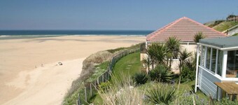 Treville soaks up the sun, which can be enjoyed from the deck with sea views.