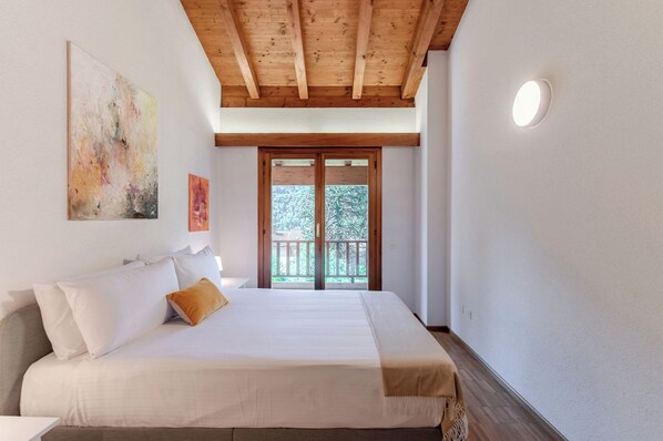 Down comforters, iron/ironing board, bed sheets