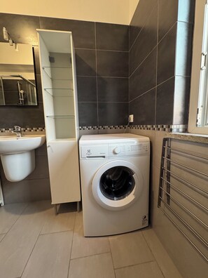 Shower, eco-friendly toiletries, hair dryer, bidet