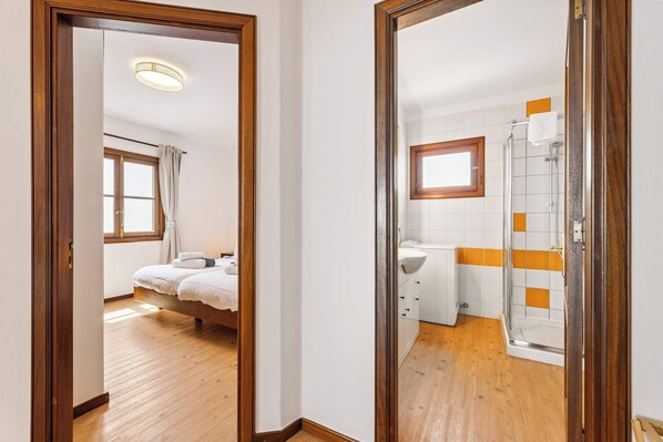 1 bedroom, desk, iron/ironing board, travel crib